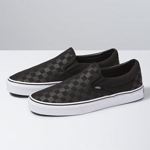 Black/Black classic slip on VANS
